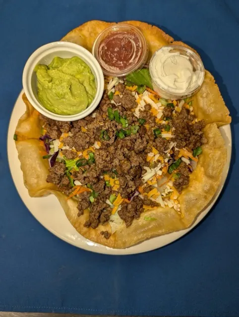 Taco Salad - Seasoned beef and cheese in a fried tortilla bowl at Cheryl's Country Kitchen in Airdrie